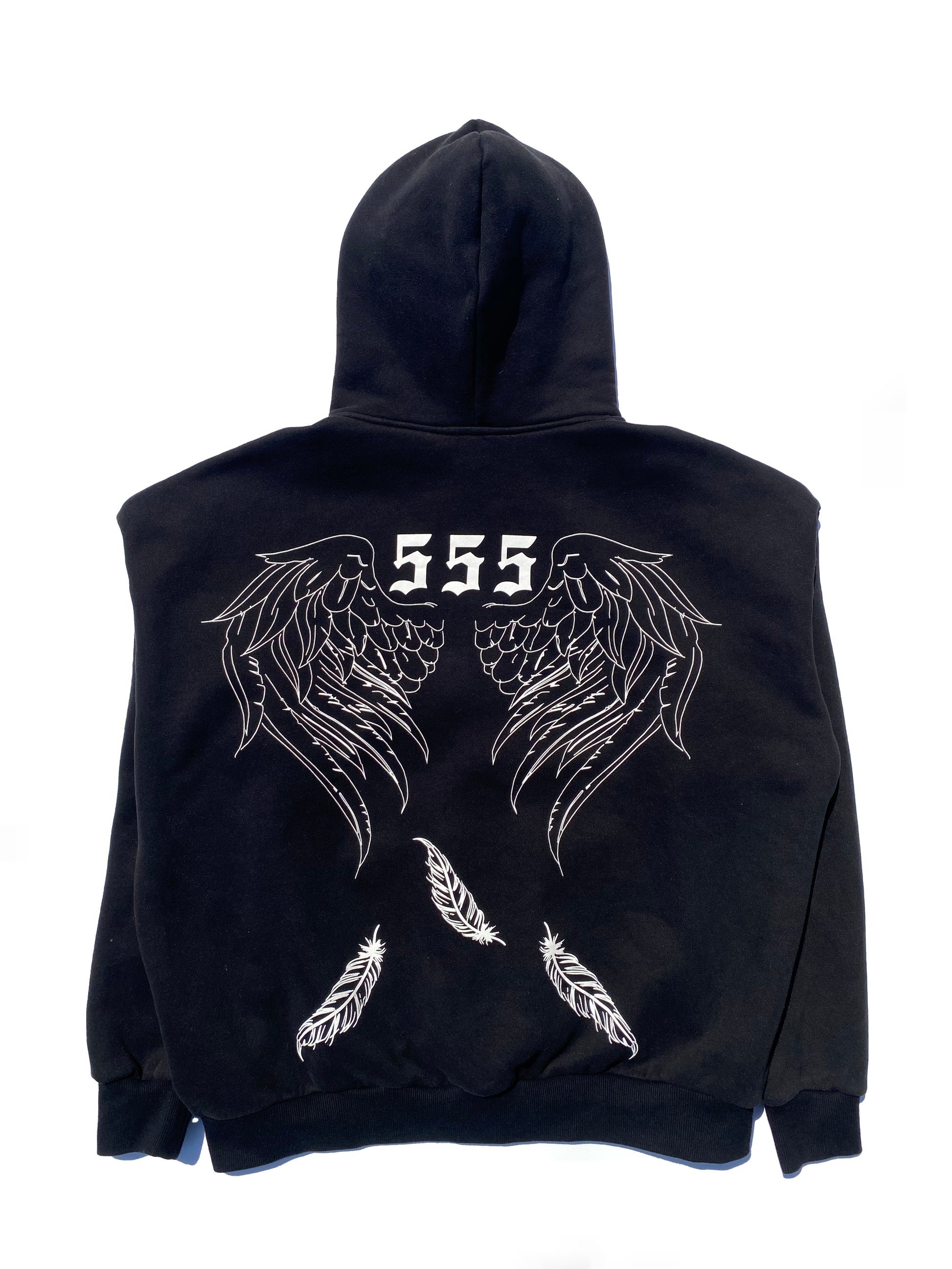 Close-up detail of Rebirth Angel Oversize Hoodie showing fabric texture and angel number 555 design 