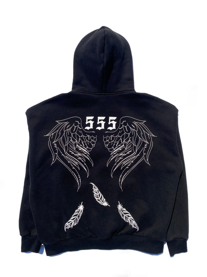 Close-up detail of Rebirth Angel Oversize Hoodie showing fabric texture and angel number 555 design 