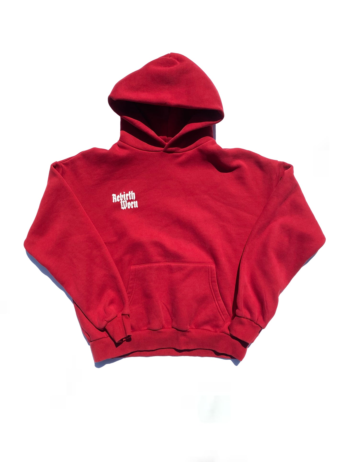 Model wearing Rebirth Angel Wings Oversize Hoodie in burgundy - front lifestyle shot showing angel wing design and 555 symbolism