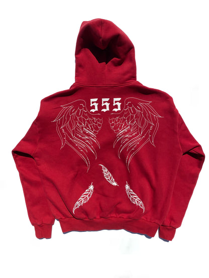 Rebirth Angel Wings Oversize Hoodie burgundy - lifestyle photo showing oversized fit and spiritual streetwear design